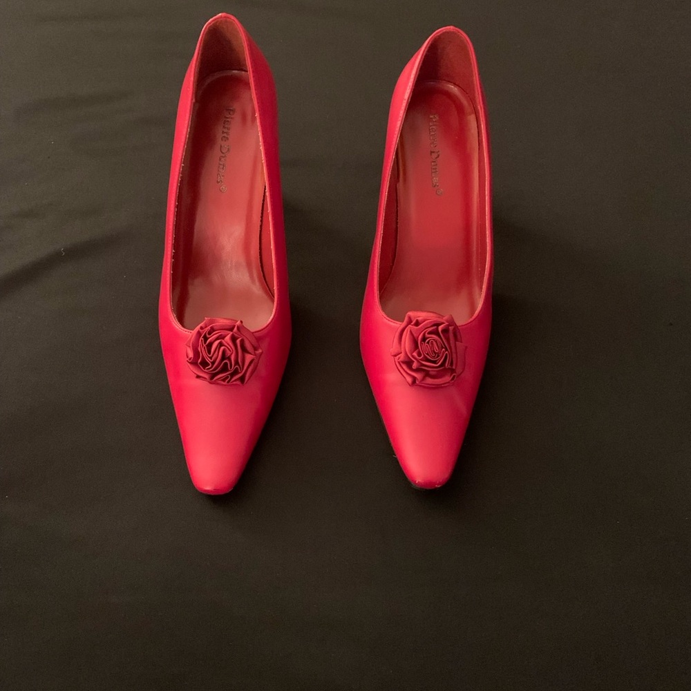 Red pump,size 10M 3 inch heel